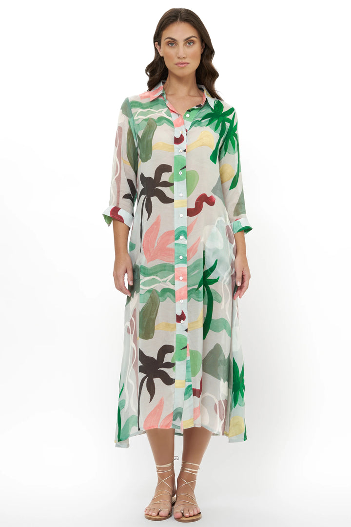 Oliphant Paradiso Midi Shirtdress displayed on a hanger, showcasing its button-up front and classic shirt dress design.