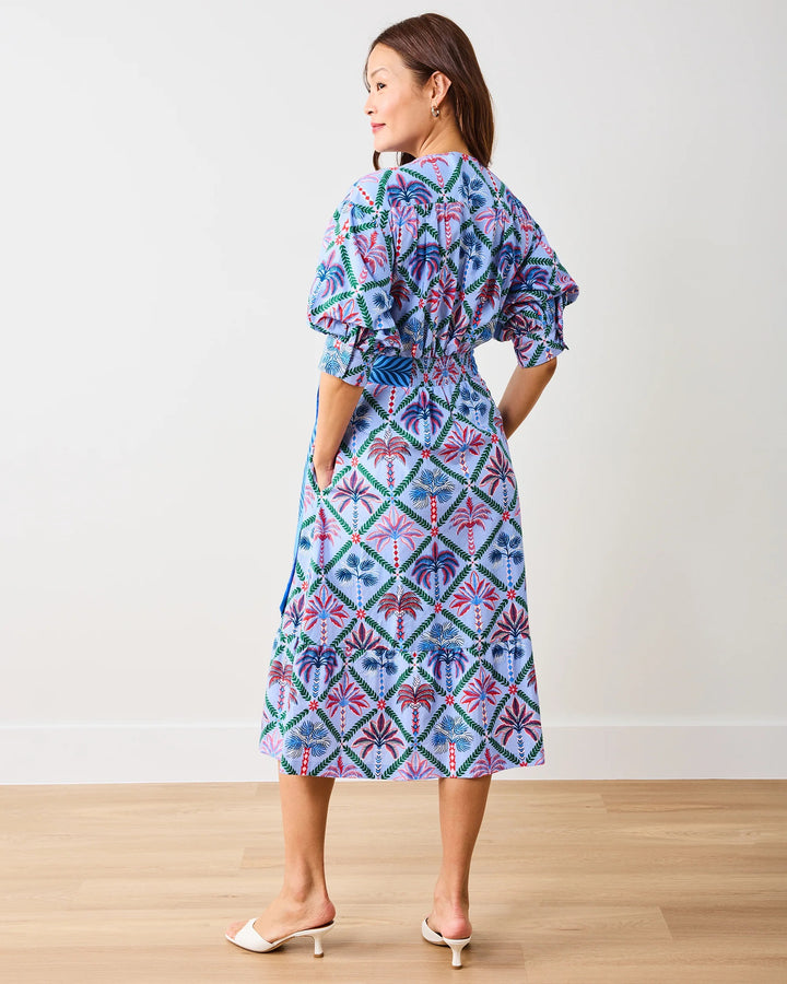 Print Fresh Gabriela Palm Tree Dress featuring a vibrant palm pattern and flowy silhouette, perfect for casual or summer wear.