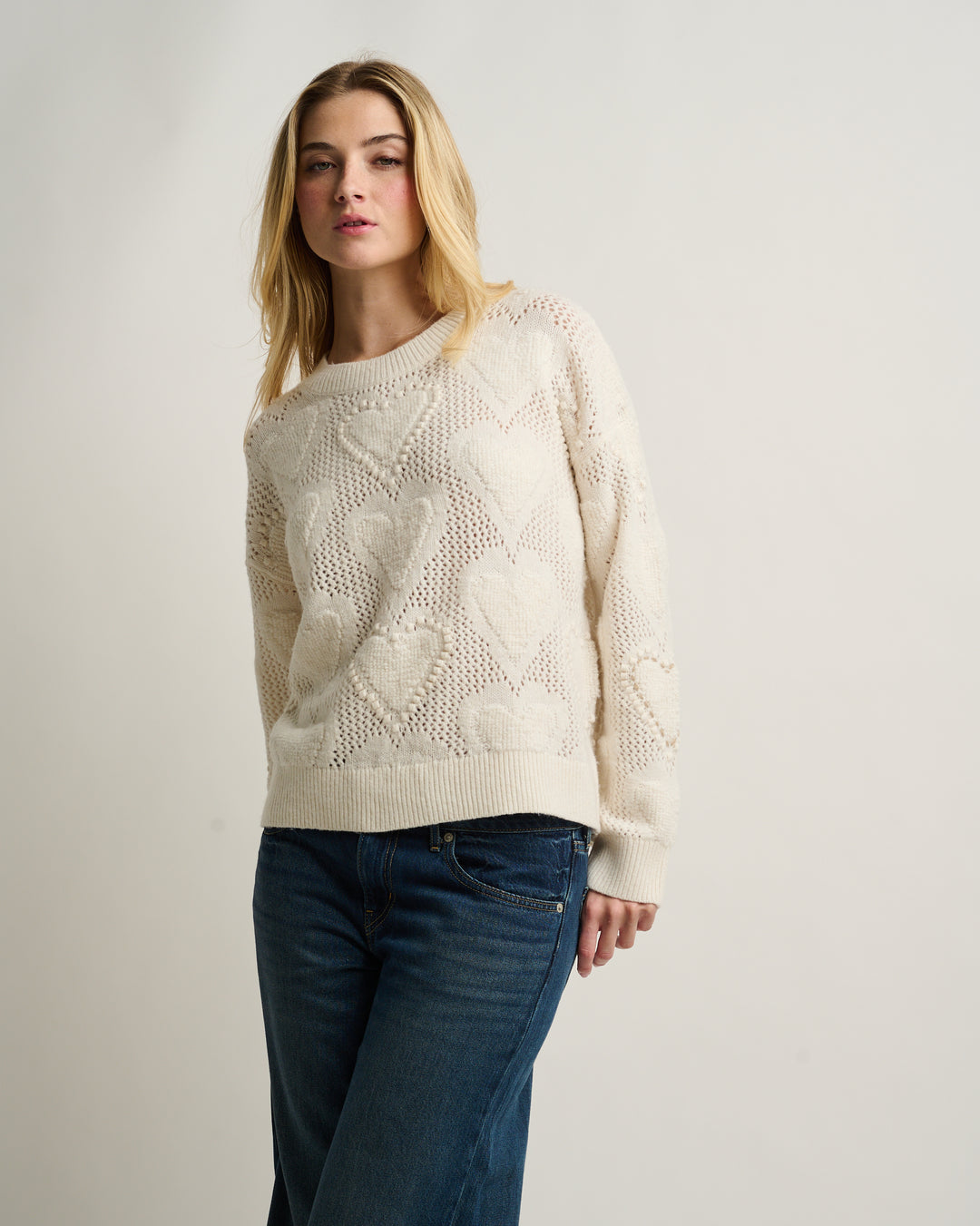 White Love Stitch sweater for women, by Lisa Todd International, featuring a cozy knit top with a stylish fit.