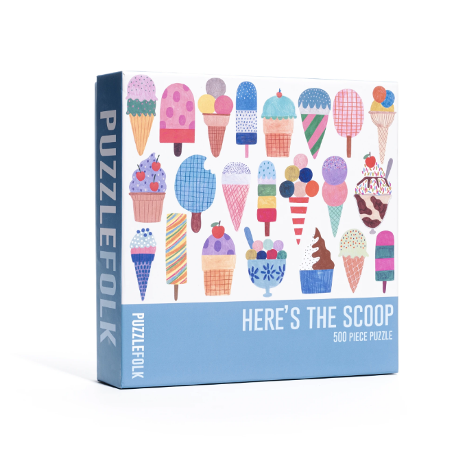 Colorful puzzle piece with "Here's The Scoop" text from Puzzlefolk, a gift puzzle featuring vibrant artwork and playful design.