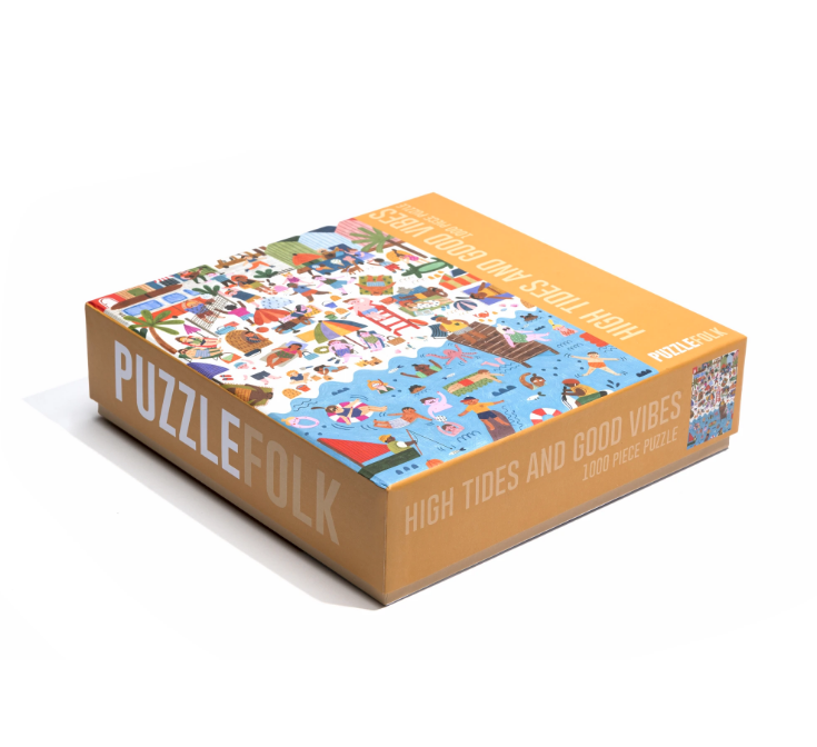 Puzzlefolk Tides & Vibes Beach puzzle featuring colorful beach scene with seashells, waves, and sand, perfect for gift-giving.