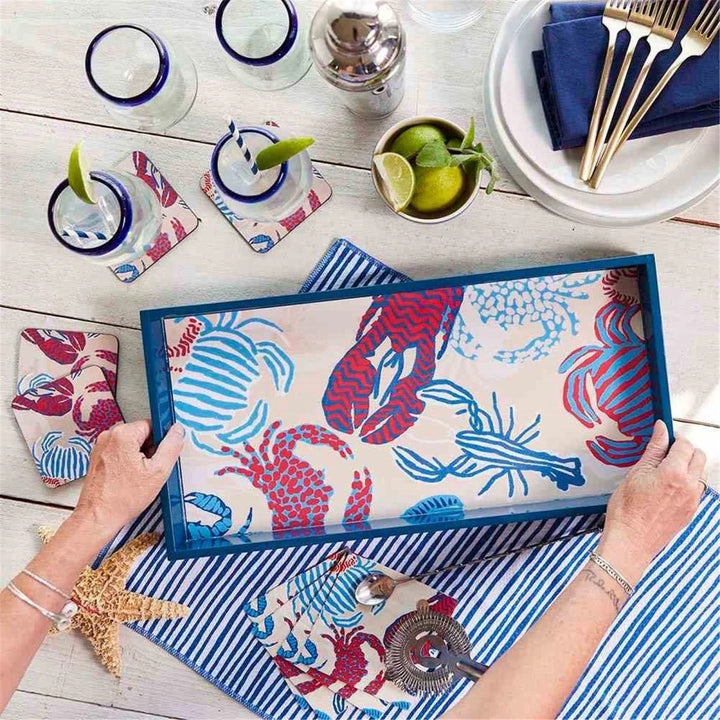 Set of four Rockflowerpaper home coasters with colorful, decorative designs for protecting surfaces and adding style.