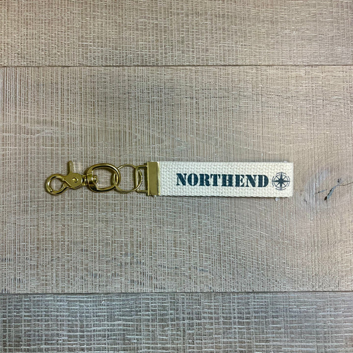 Rustic Marlin local key fobs gift set with decorative keychain and attached keys on a neutral background.