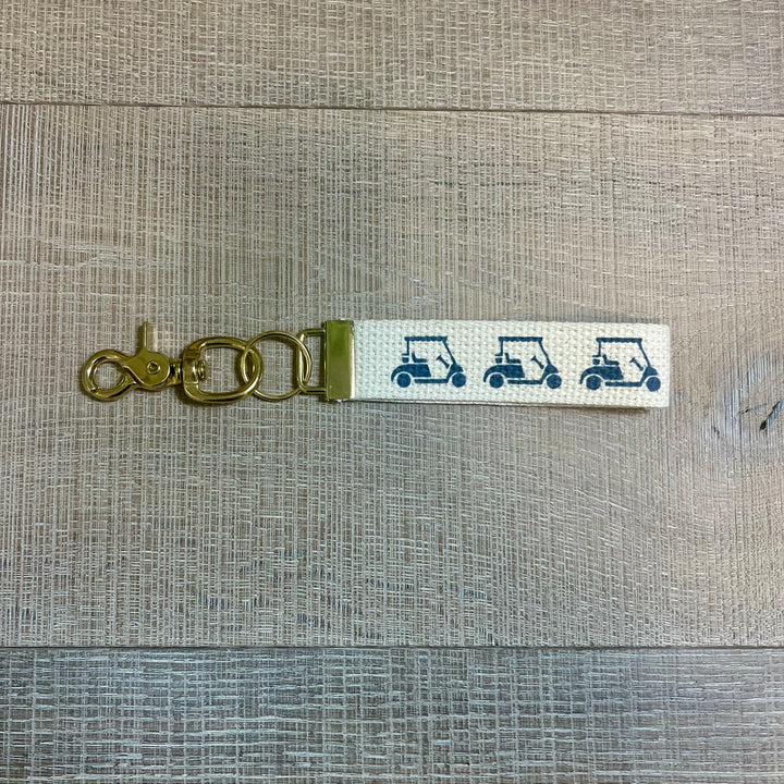 Rustic Marlin local key fobs gift set featuring decorative leather keychains with rustic accents and keyring attachments.