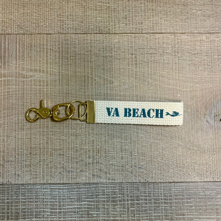 Rustic Marlin local key fob gift with leather and metal accents, featuring a rustic design and keychain attachment.