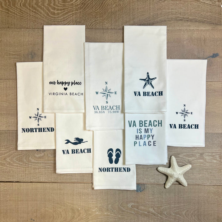 Rustic Marlin local dish towels with colorful, patterned designs, ideal for gift-giving and kitchen use.