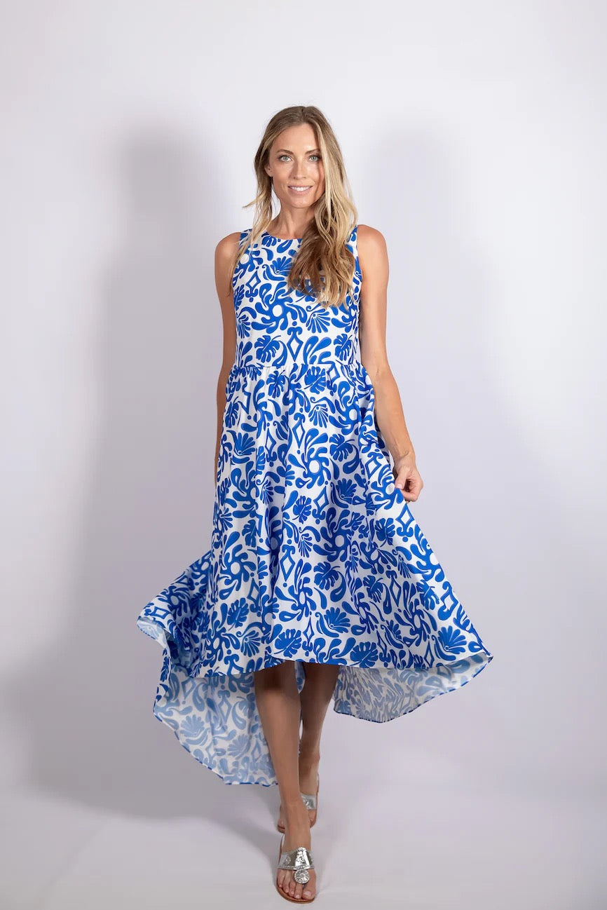 Sail to Sable high-low party dress in vibrant fabric, flowing skirt, and stylish design perfect for elegant occasions.