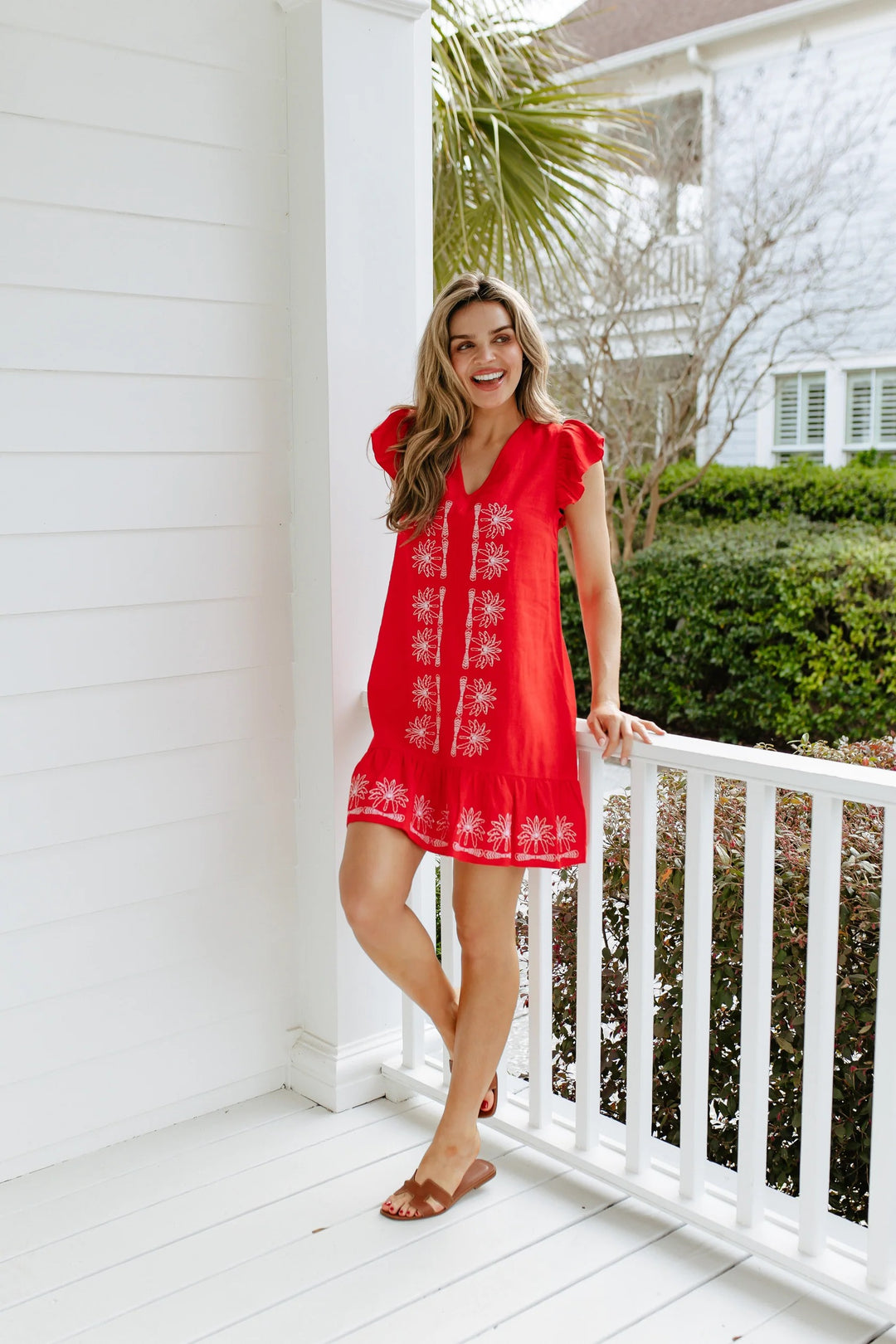 Flame V-Neck Ruffle Dress by Sail to Sable featuring a flowing silhouette and feminine ruffle details on the neckline.