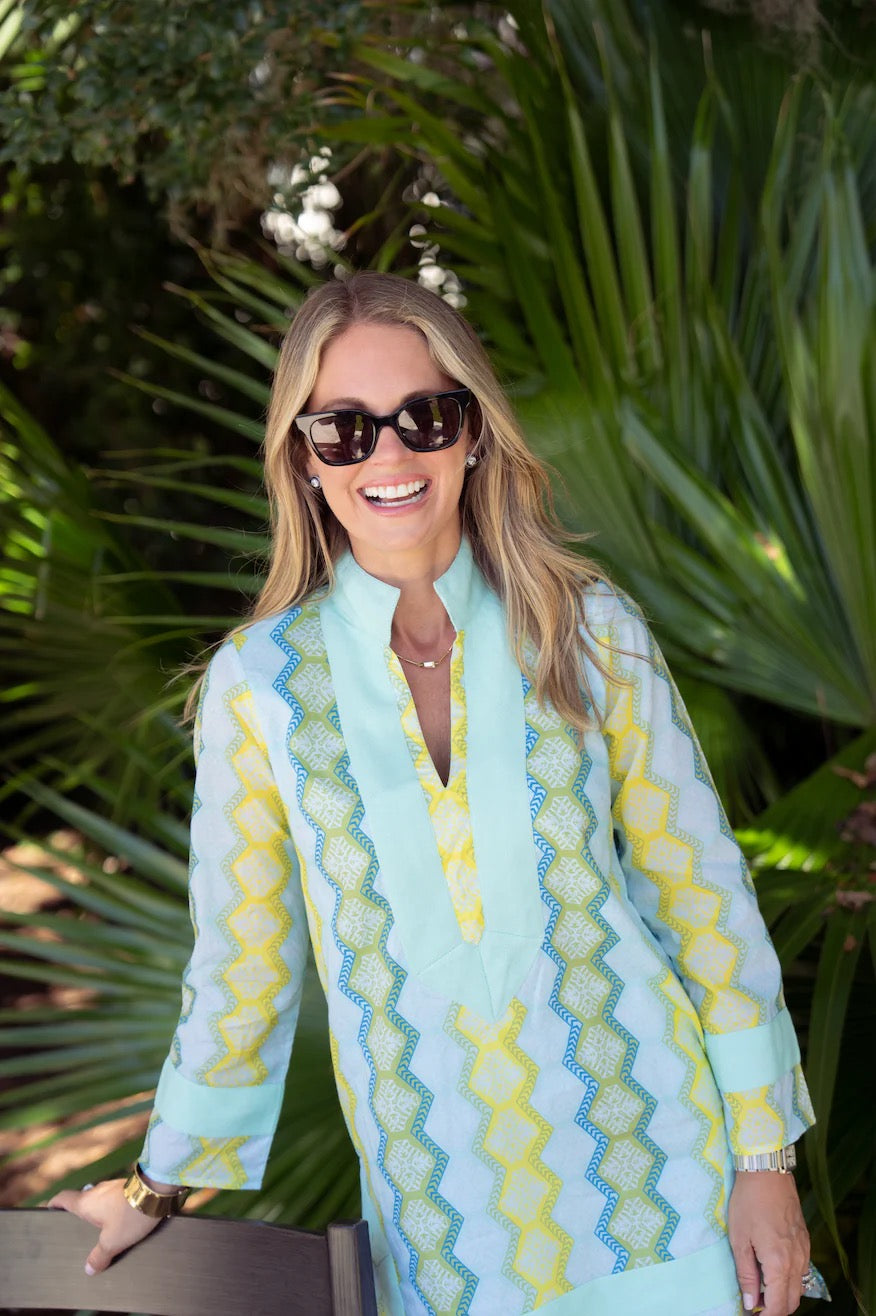 Sail to Sable Jana Geo Stripe Tunic dress with vibrant geometric pattern and relaxed fit, shown on a model.