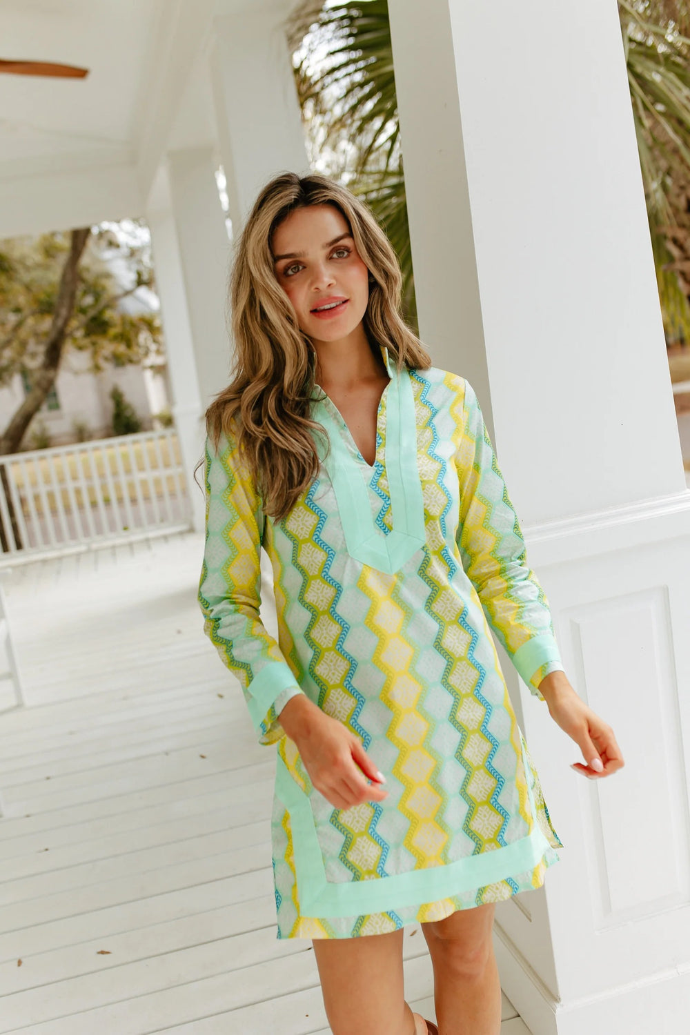 Sail to Sable Jana Geo Stripe Tunic dress with vibrant geometric patterns and relaxed fit, shown from the front.
