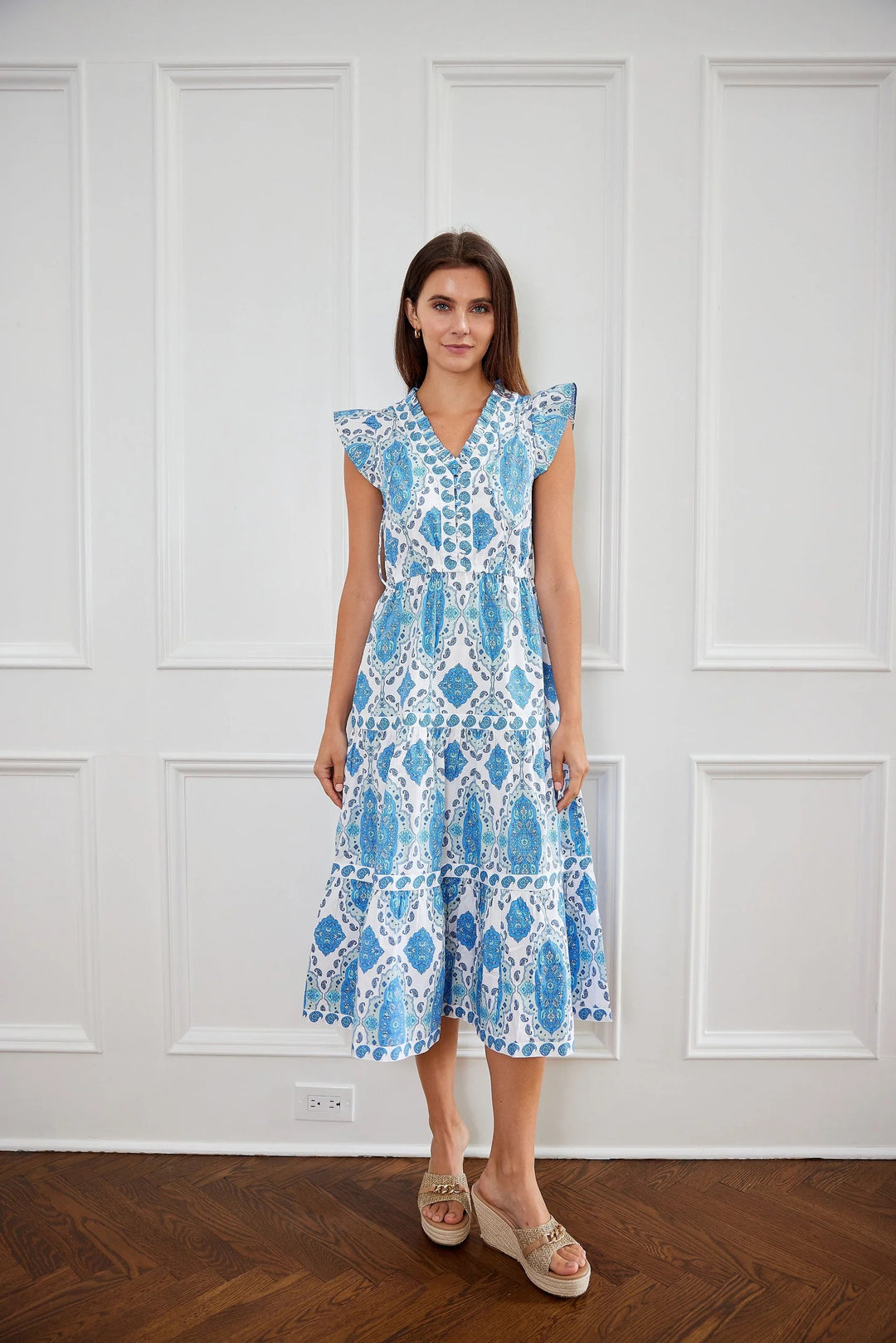 Sail to Sable Paisley Park Midi Flutter Dress with flowing fabric, vibrant paisley pattern, and flutter sleeves for a stylish look.