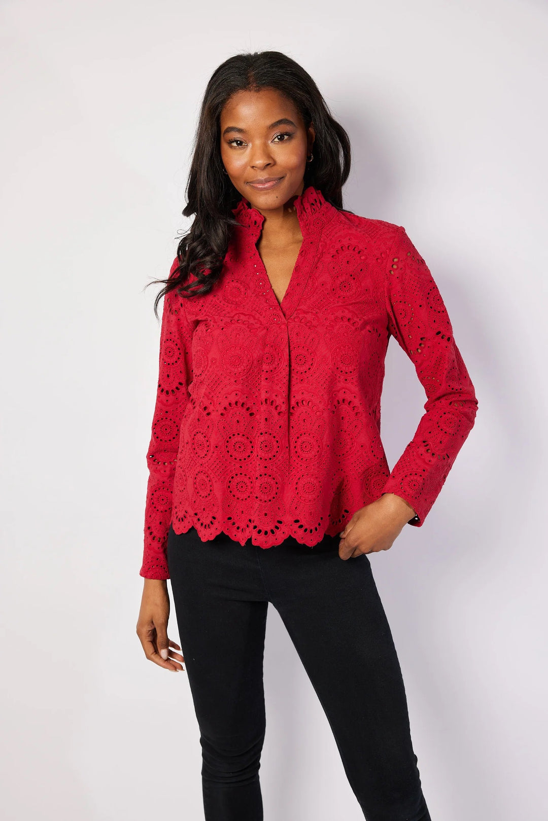 Red scalloped hem top by Sail to Sable, featuring a stylish design with scalloped edges and a relaxed fit, shown on a model.