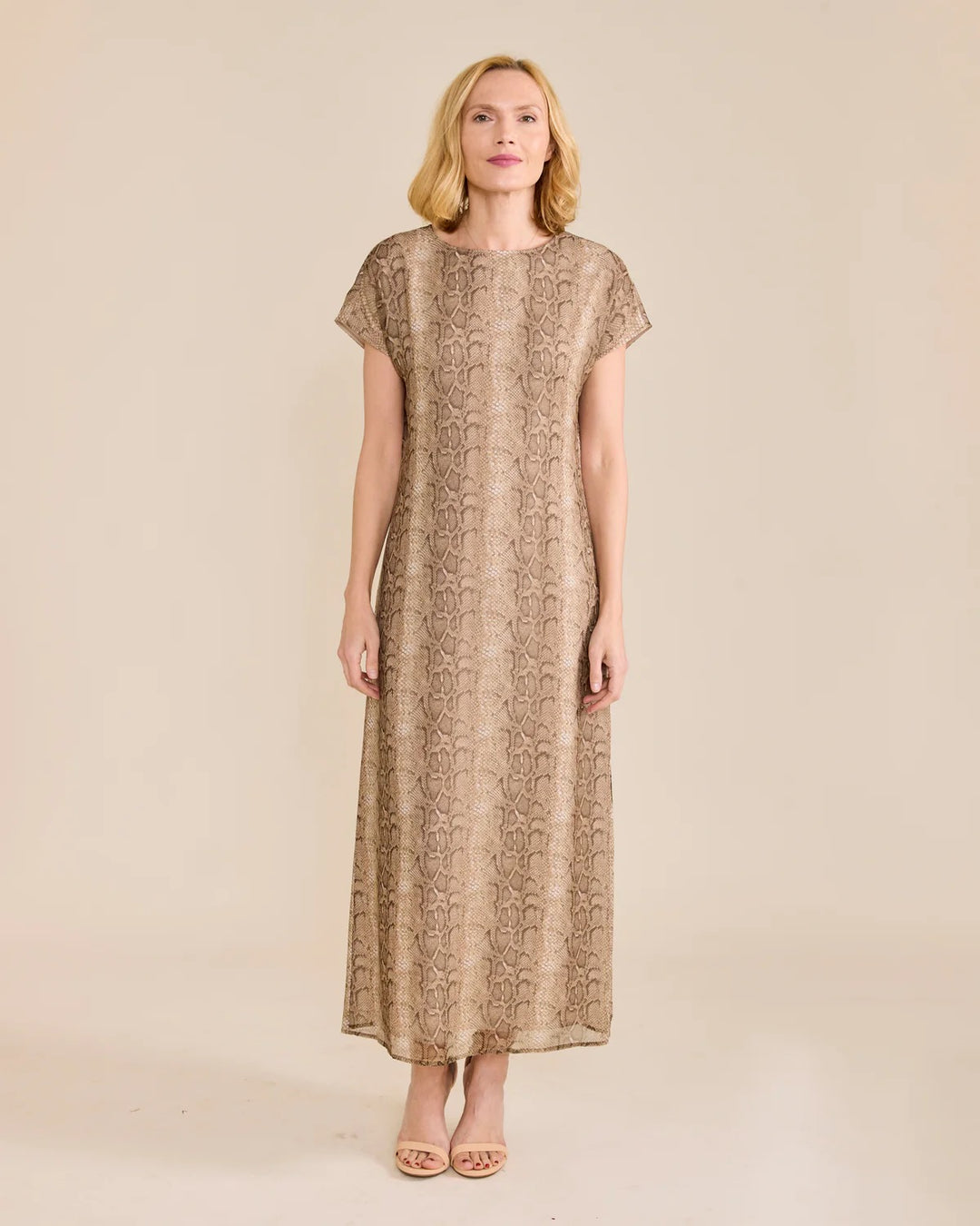 Sedge Beth Snake Dress featuring a stylish snake print, fitted silhouette, and sleeveless design perfect for trendy occasions.