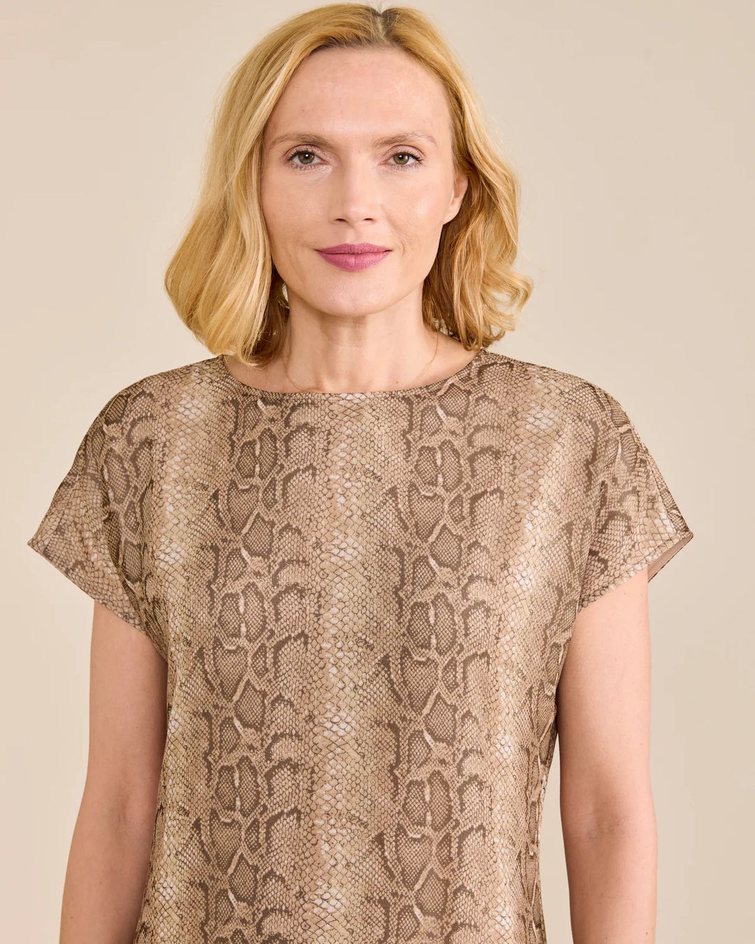 Sedge Beth Snake Dress featuring a stylish snake print, fitted silhouette, and long sleeves perfect for versatile occasions.