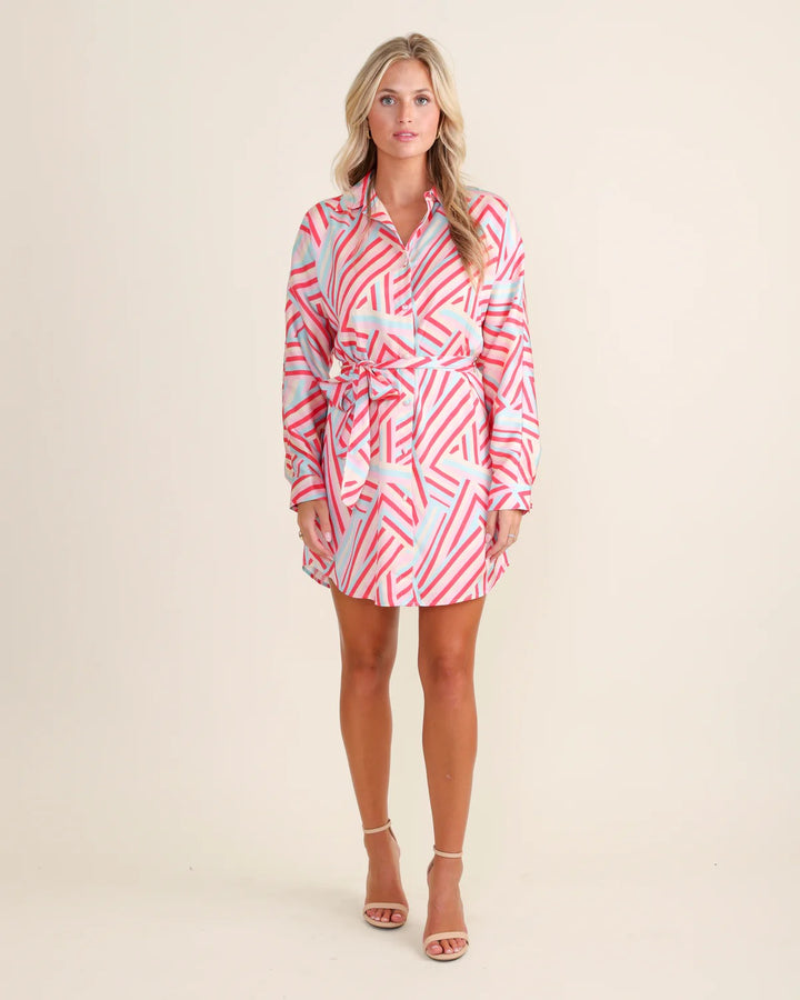 Sedge Margaret Art Basel dress displayed on a mannequin featuring an abstract, colorful pattern and elegant fit.