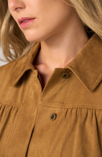 Liverpool Jeans puff sleeve jacket with laser cut hem, stylish top featuring feminine puff sleeves and intricate cut-out details.