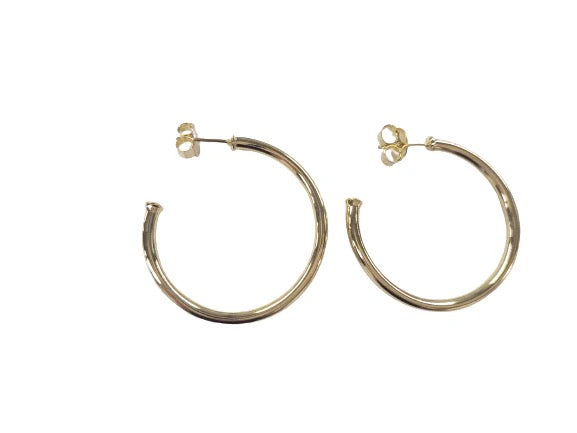 Sheila Fajl Petite Favorite Hoops 1.5-inch gold-tone earrings with smooth, rounded design, perfect for everyday accessories.