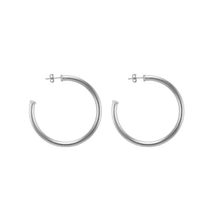 Sheila Fajl Petite Favorite Hoops 1.5-inch gold earrings with a simple, elegant hoop design for accessories.