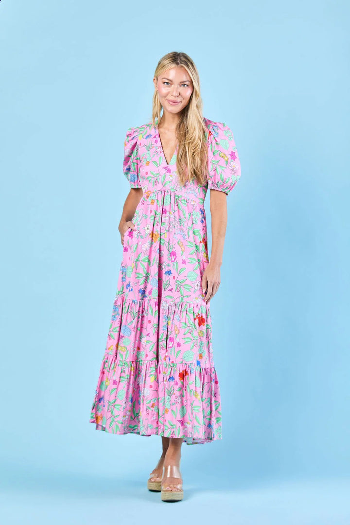 Sheridan French Margot Wildflower Dress with floral pattern, fitted bodice, and flowing skirt, displayed on a hanger.