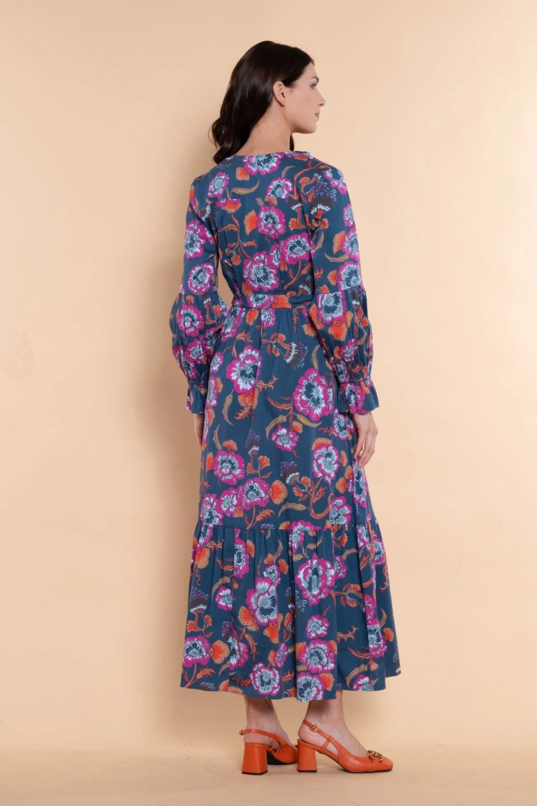 Sheridan French Britt Twilight Flora Dress displayed on a hanger with floral patterns and lightweight fabric.
