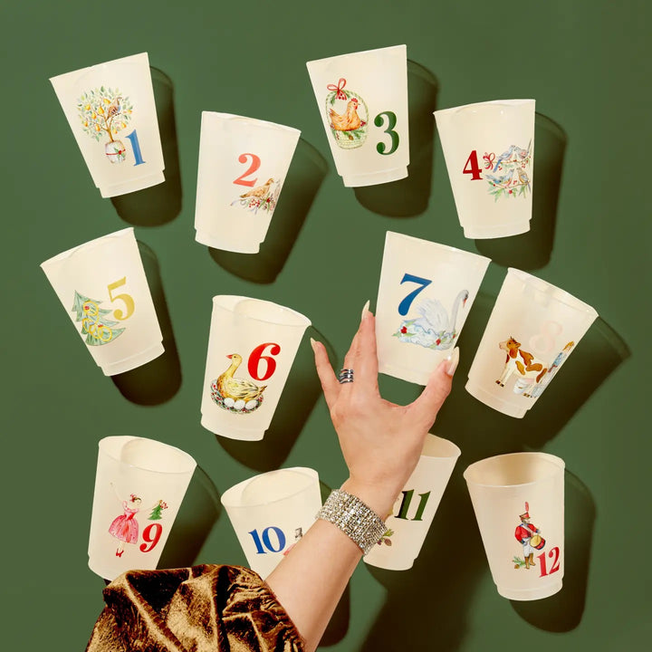 Frosted 12 Days of Christmas cups from Sip Sip Hooray, festive holiday-themed home drinkware with colorful designs.