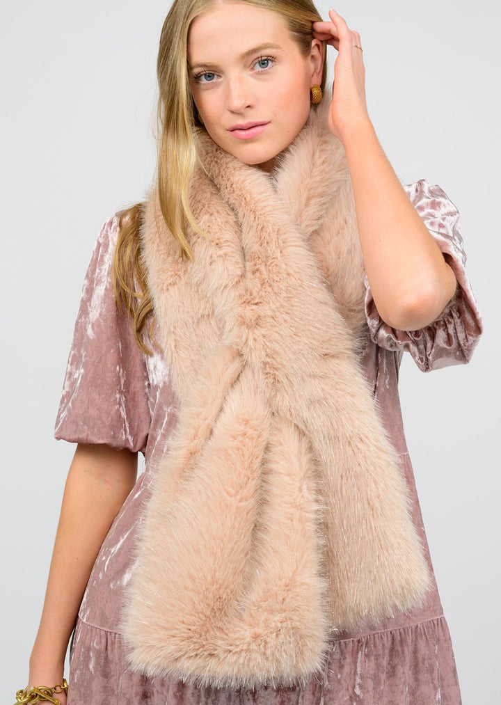 Sister Mary faux fur pull-through scarf draped over a model, showcasing its plush, cozy texture and stylish accessory design.