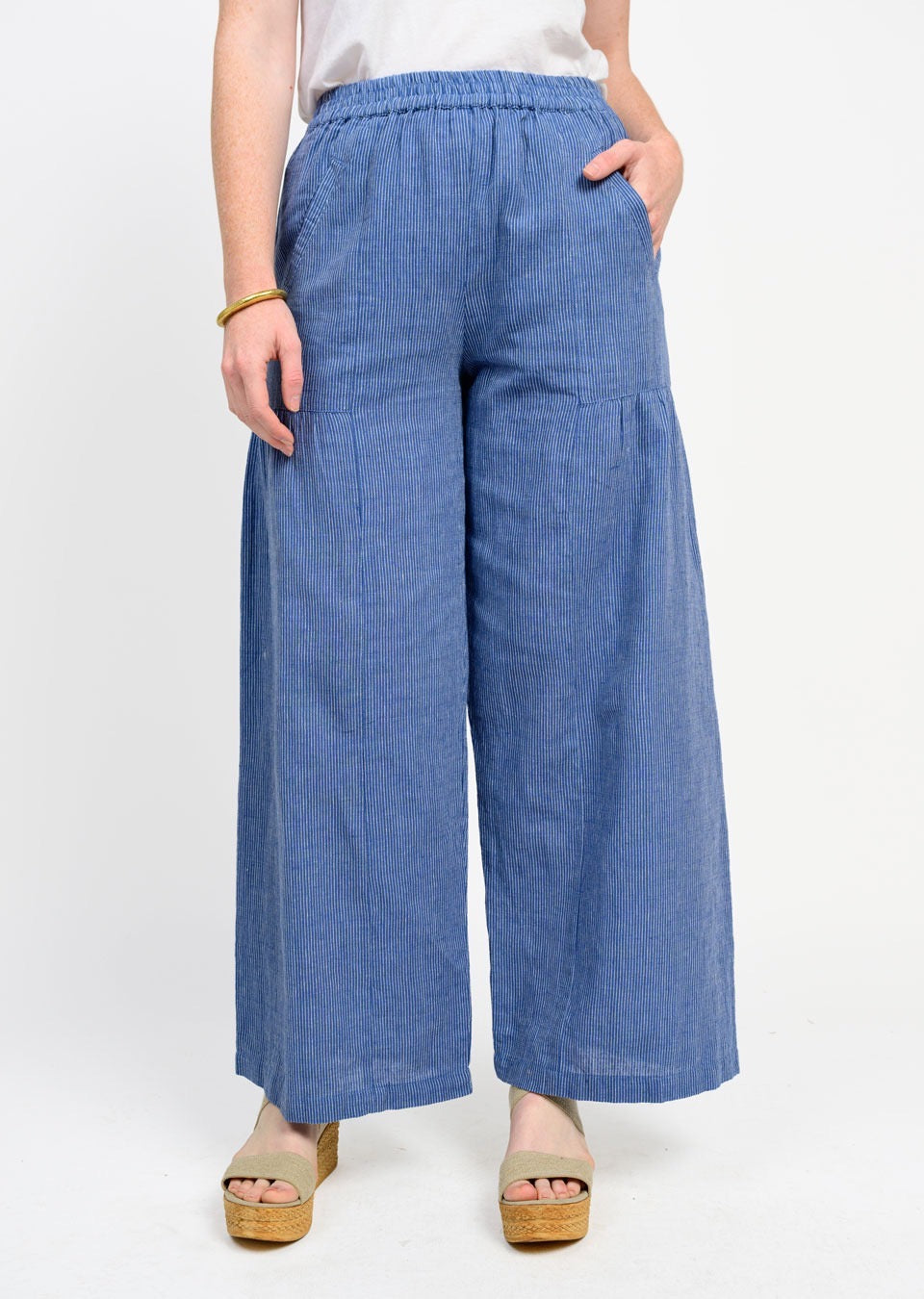 Sister Mary wide-leg stripe pant showcasing high-waisted design and bold vertical stripe pattern in natural fabric.