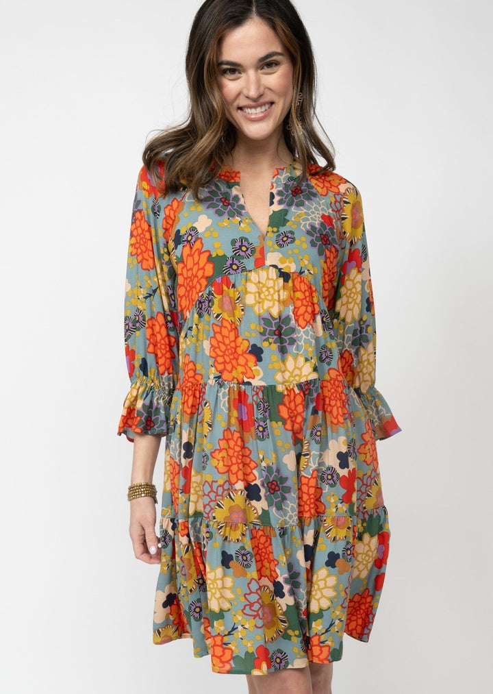 Sister Mary floral Sala dress with vibrant flower patterns, flowing fabric, and elegant design perfect for special occasions.