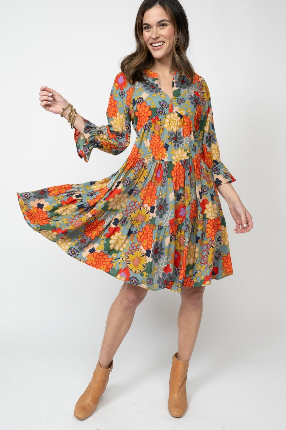 Sister Mary floral Sala dress with vibrant colorful pattern, lightweight fabric, and flowing design for casual or special occasions.