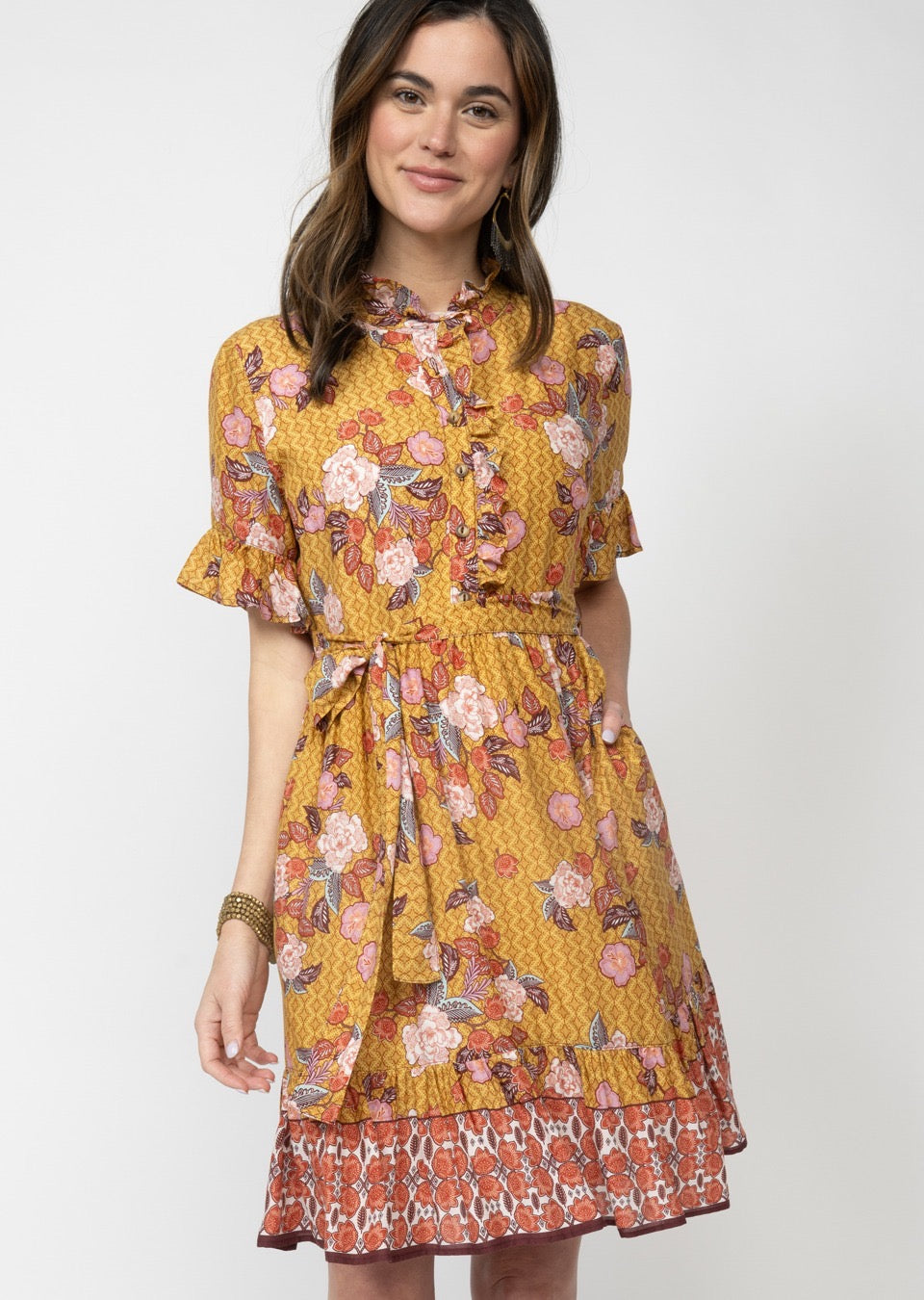 Sister Mary Garden Trellis Dress featuring a floral pattern with a fitted bodice and flowing skirt, perfect for spring attire.