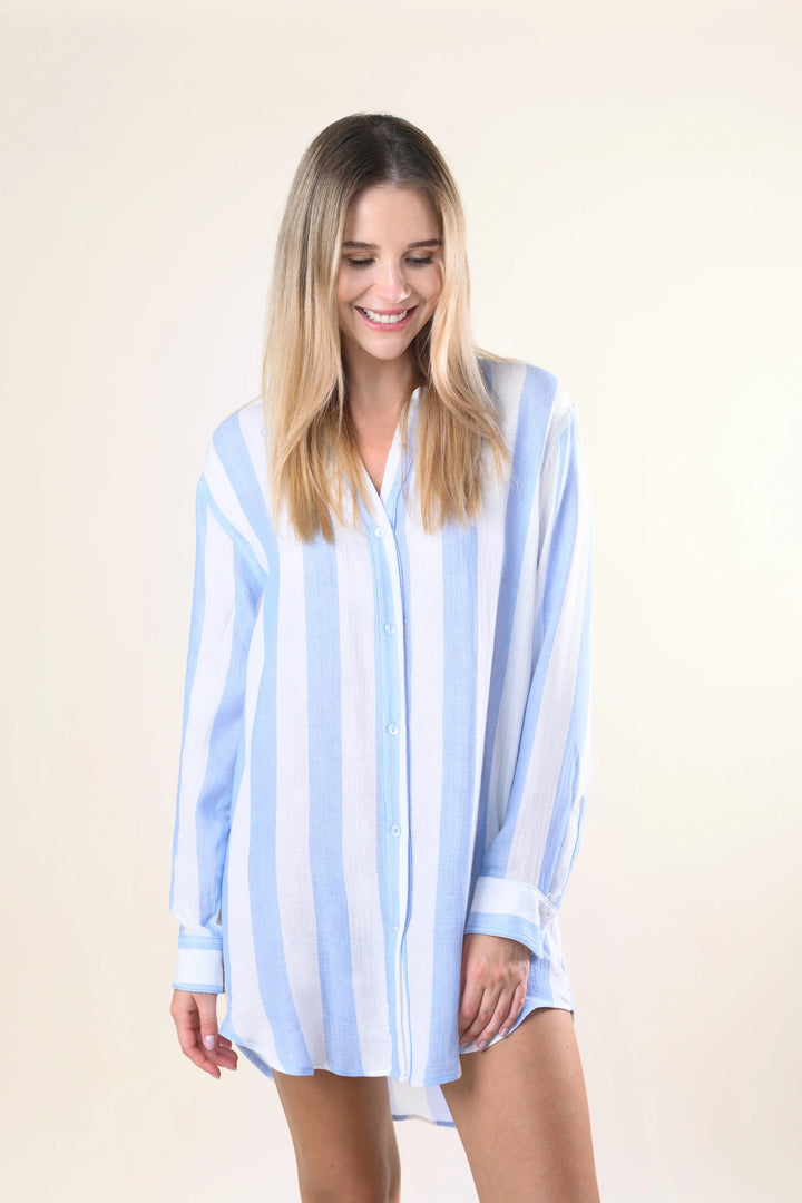 Sitano Positano striped shirtdress displayed on a hanger, featuring blue and white horizontal stripes and a classic button-down design.