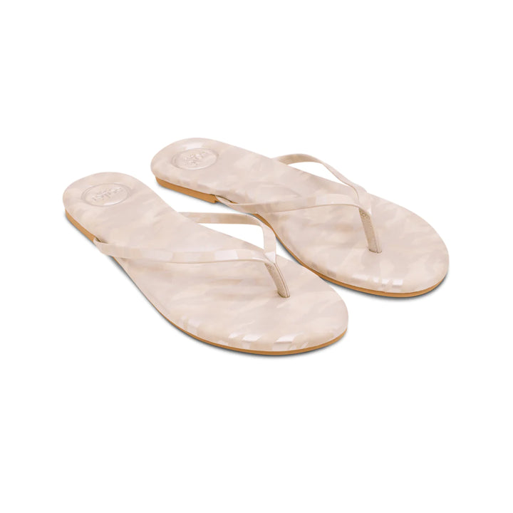 Elegant Solei Sandals accessories with stylish straps and neutral color, perfect for casual summer outfits.
