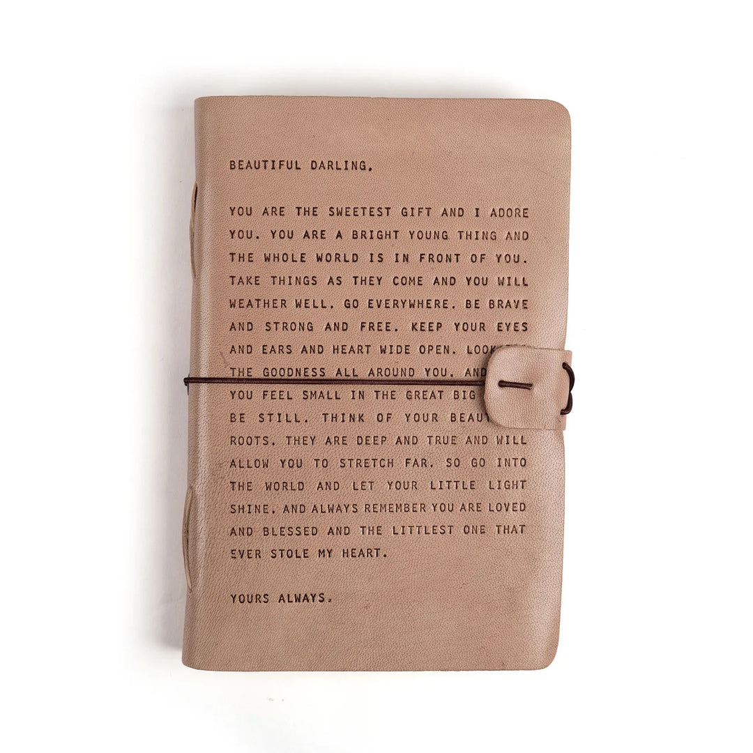 Artisan leather journal from sugarboo Designs with a rustic cover, ideal for gift-giving and personal writing.