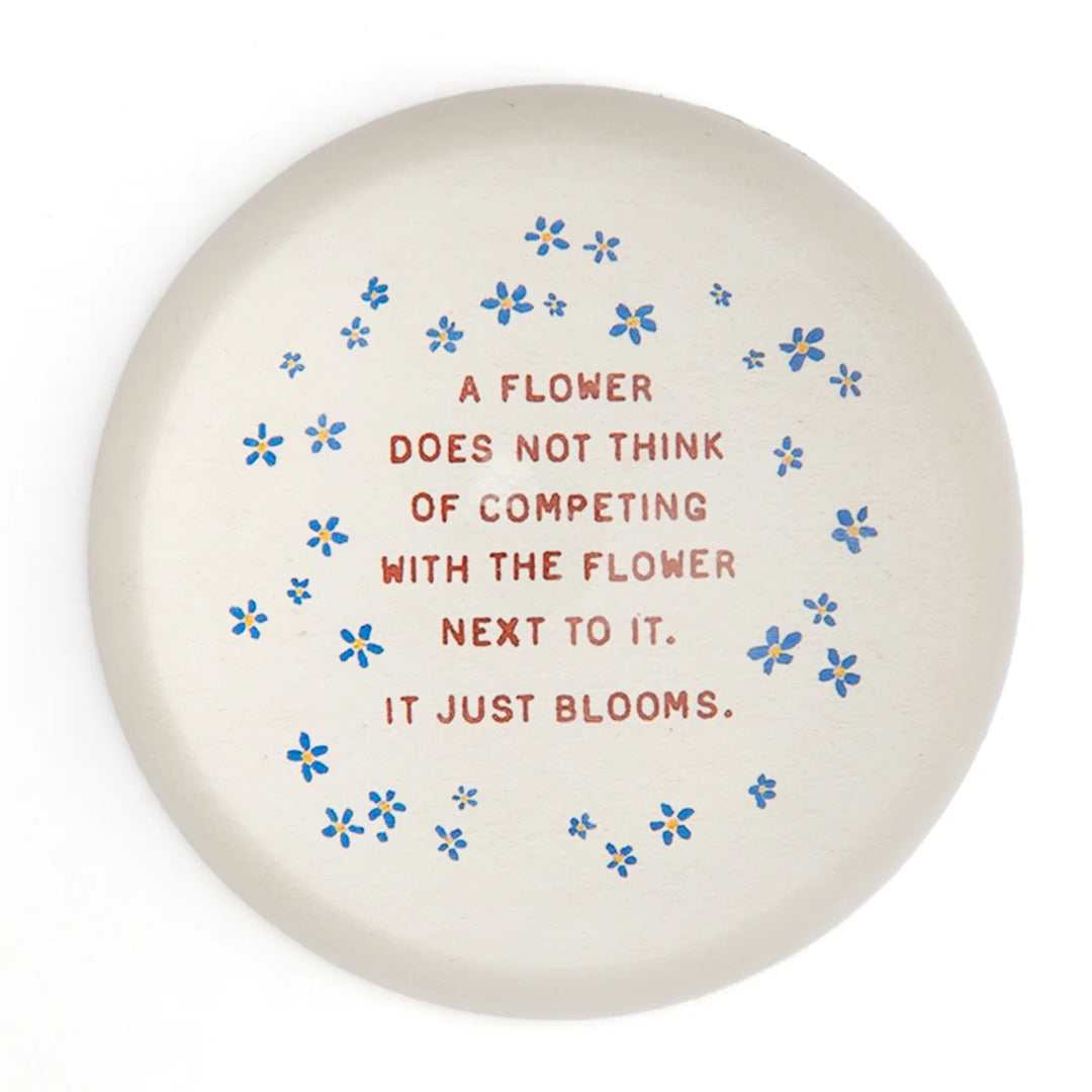 Round paperweight from Sugarboo Designs, 4x4 inches, decorative gift with a smooth surface and artistic design.