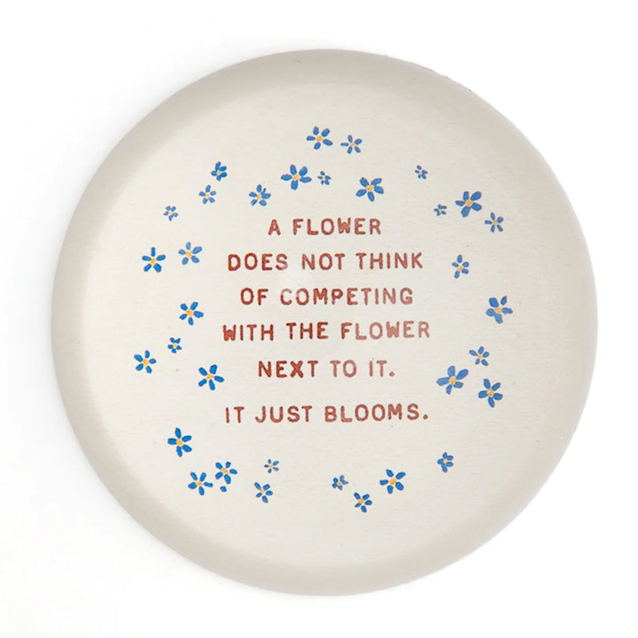 Round paperweight from Sugarboo Designs, 4x4 inches, decorative gift with a smooth surface and artistic design.