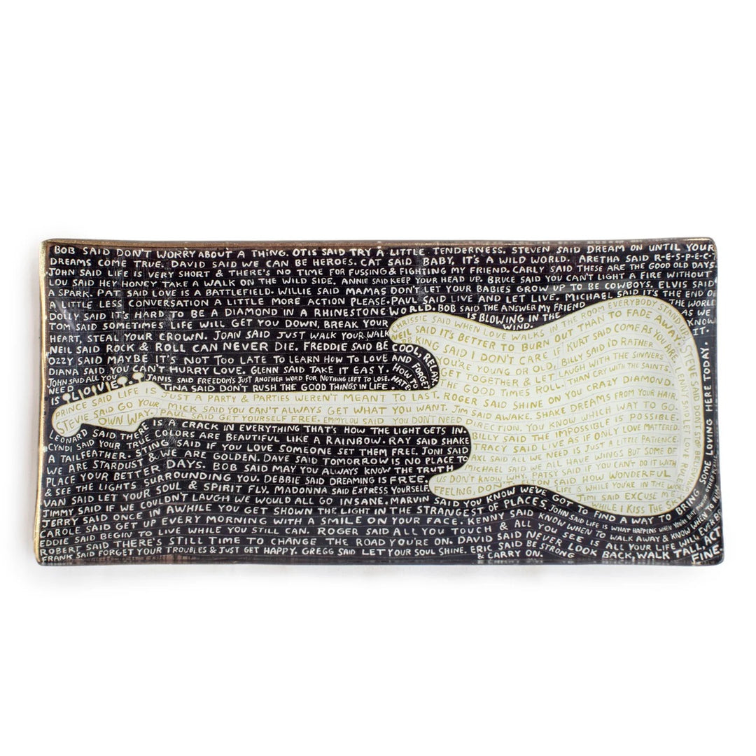 Small decoupage tray by Sugarboo Designs with intricate floral and vintage-inspired patterns on a wooden surface.