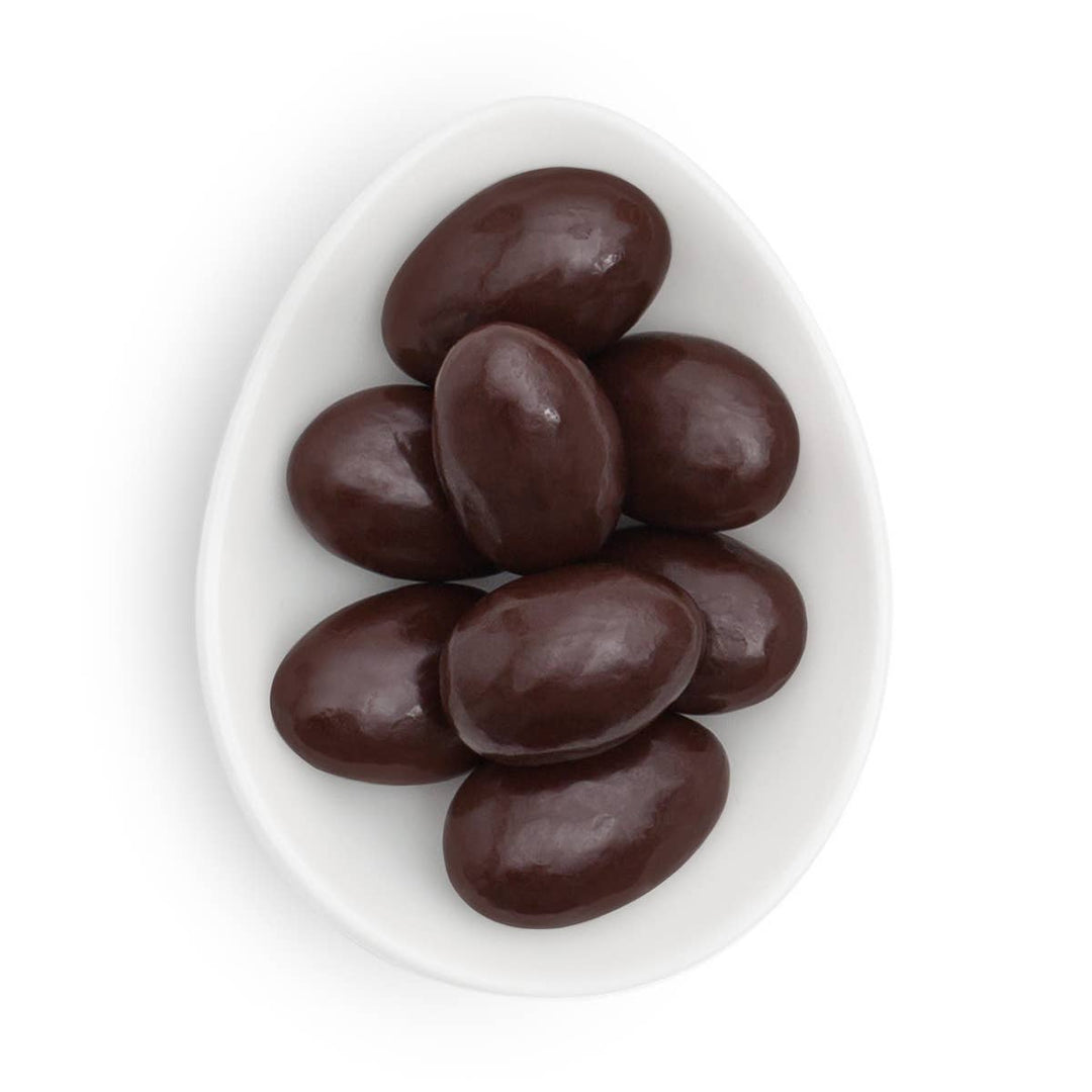 Small gift box of Sugarfina sugar-free dark chocolate almonds with a decorative ribbon, perfect for gifting.