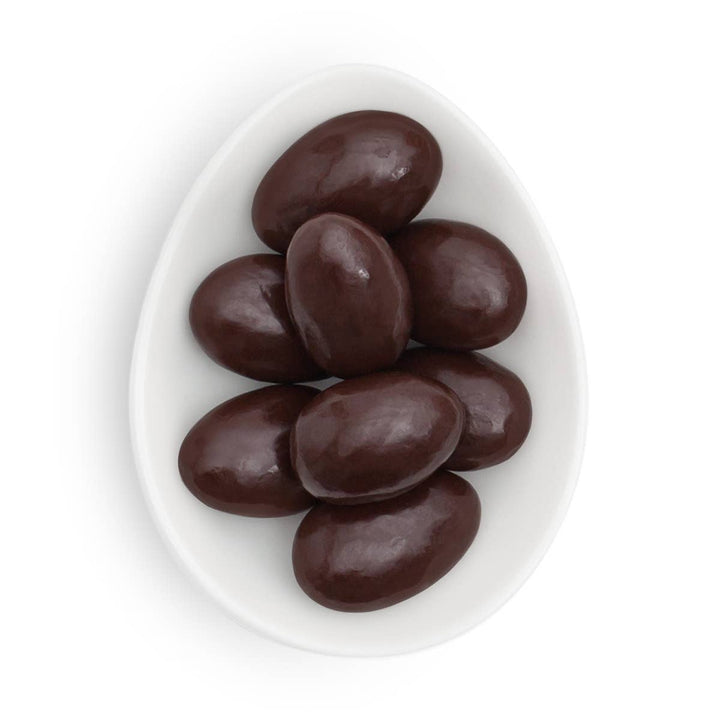 Small gift box of Sugarfina sugar-free dark chocolate almonds with a decorative ribbon, perfect for gifting.