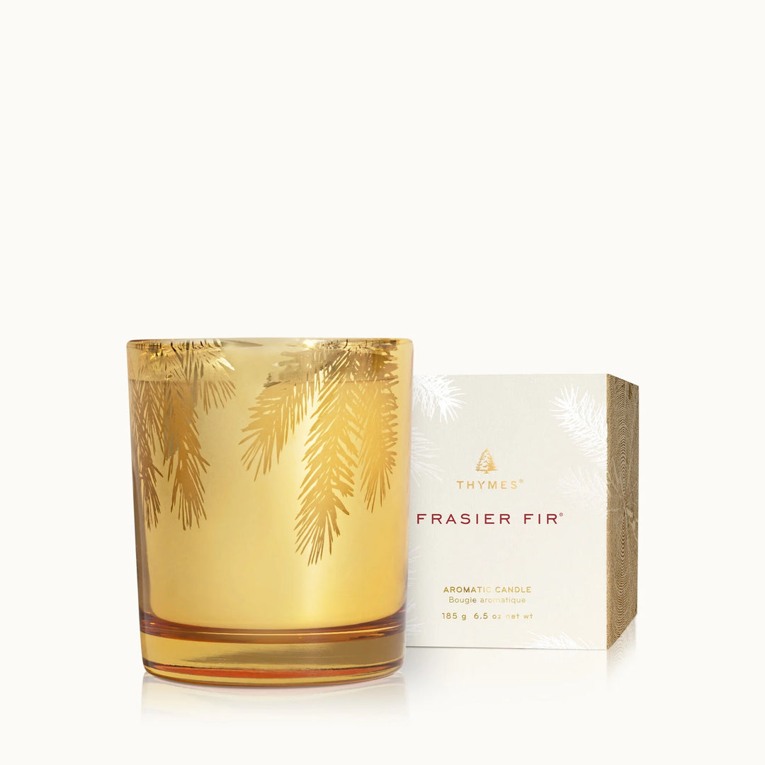 Thymes Gilded Gold 6.5-inch candle in a decorative gold holder, perfect for home decor and ambient lighting.