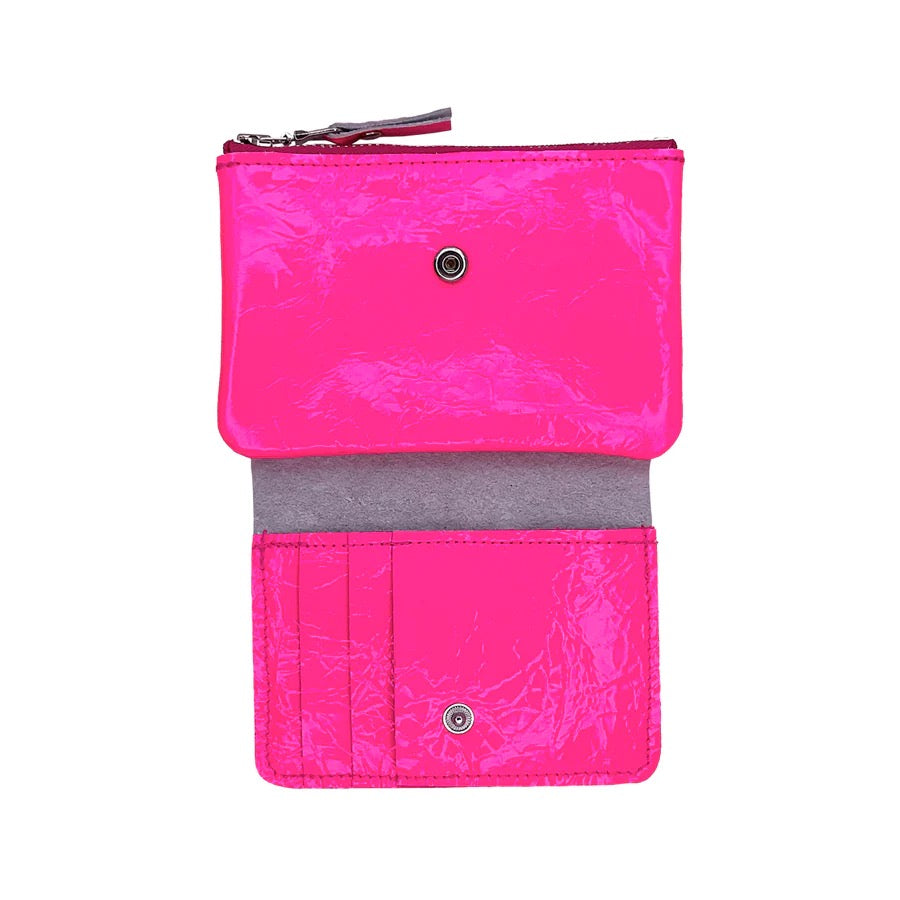 Tracey Tanner Nico Wrap Wallet accessories with leather exterior and wrap closure, showcasing stylish design and compact size.