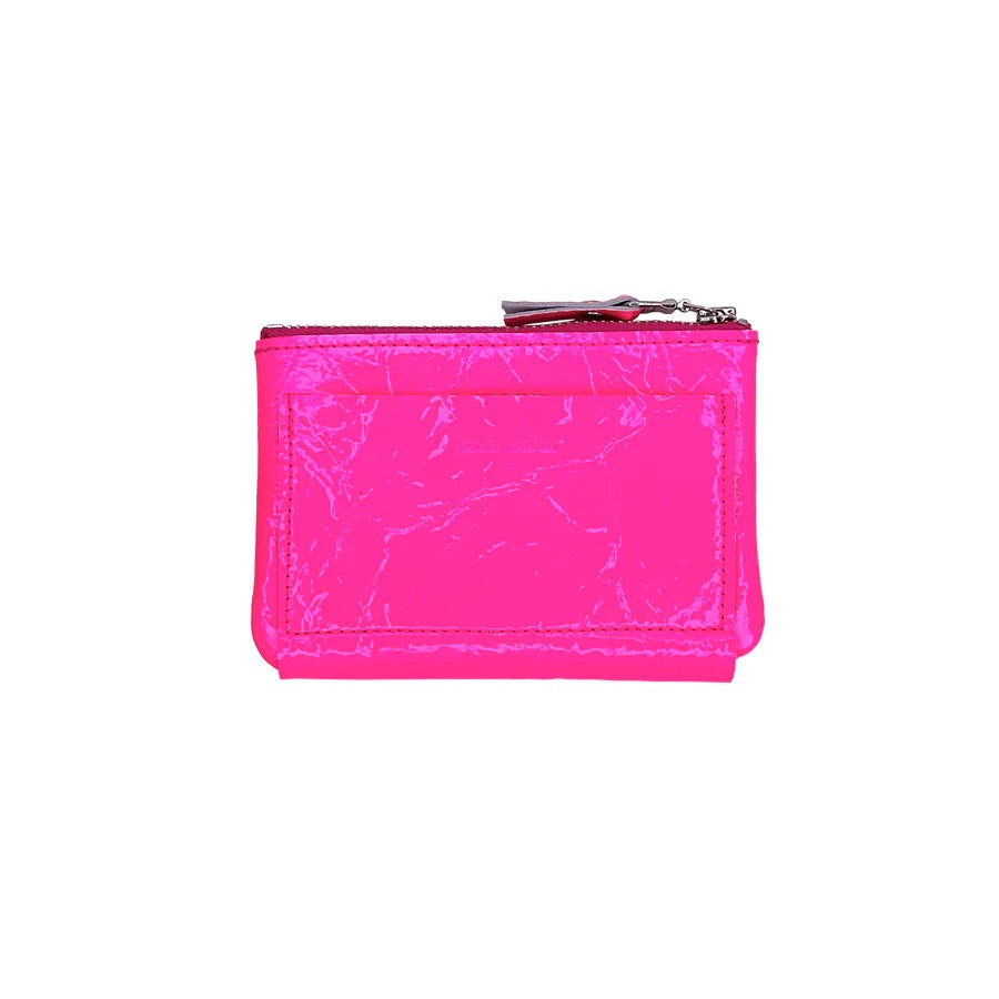 Tracey Tanner Nico Wrap Wallet showing black leather exterior with wrap-around strap and compact design.