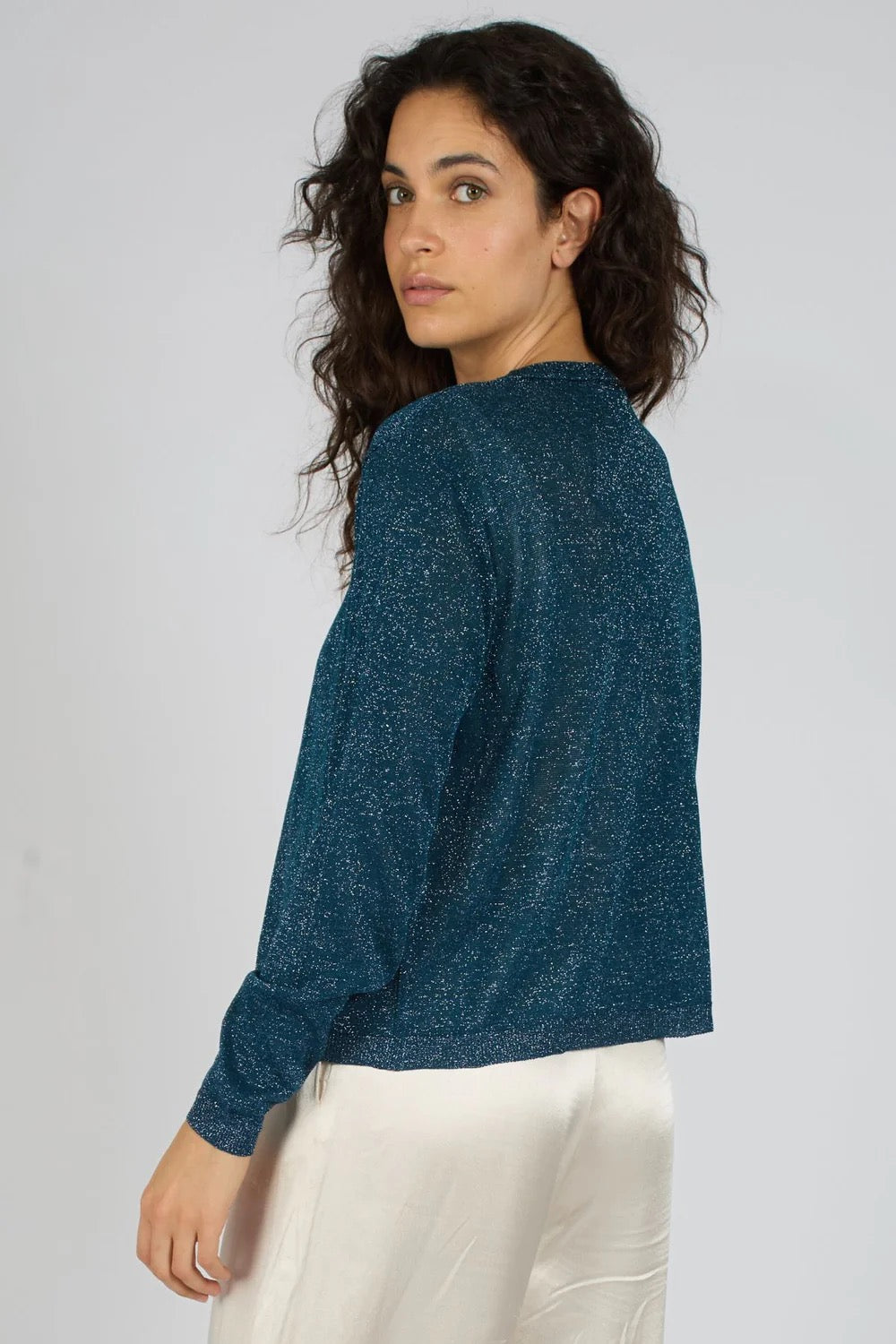 Traffic People Ava Cardigan, stylish knit top in neutral color, featuring a relaxed fit and open front design.