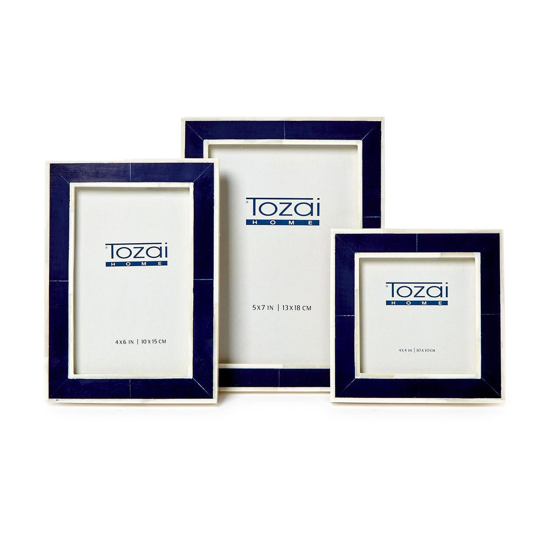 Navy bone and resin frame for home decor by Two's Company, featuring a stylish, modern design with a navy finish and textured details.