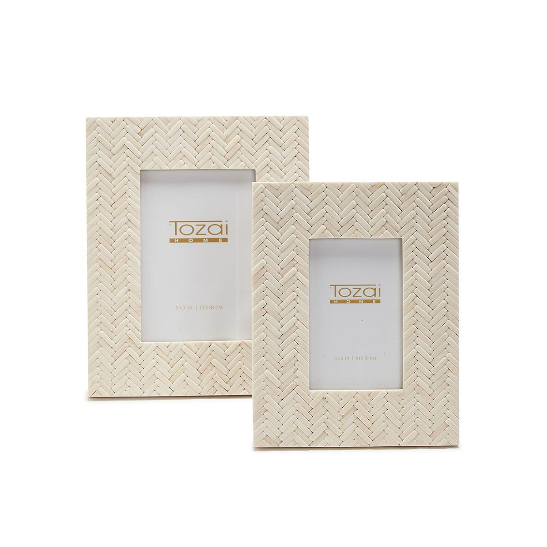 Basketweave picture frame by Two's Company, home decor accessory with woven design, suitable for framing photos or artwork.