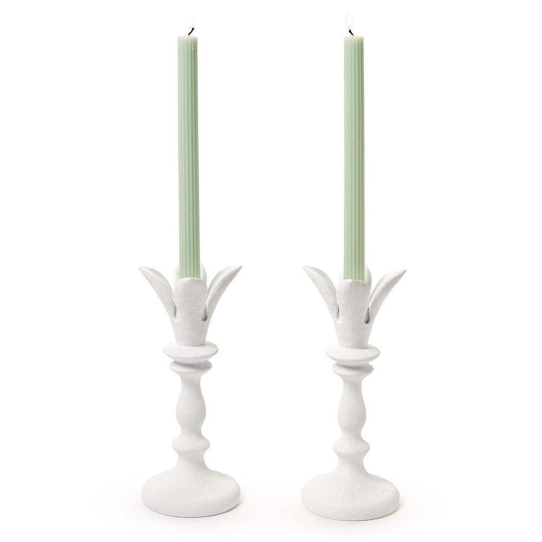 Set of two flora-themed candle holders from Two's Company, elegant home decor accessories with intricate floral designs.