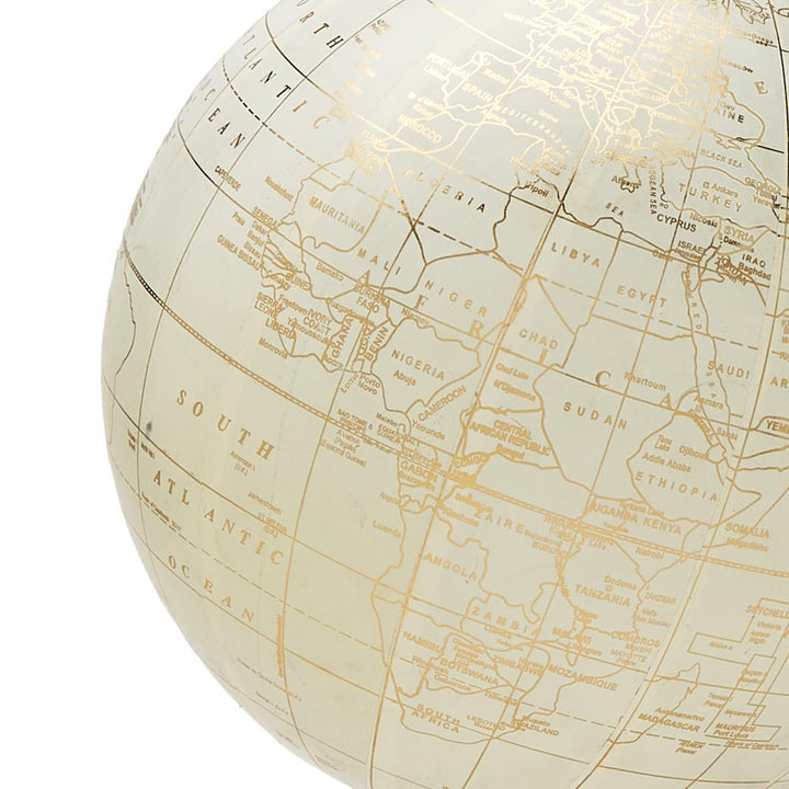 Decorative globe on marble base, ideal for home decor, by Two's Company, showcasing a detailed world map on a sleek marble stand.