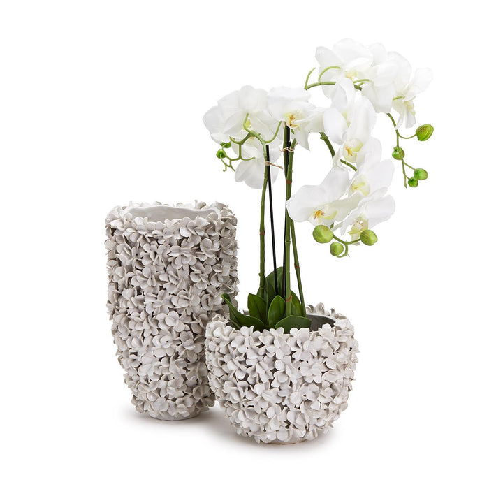 Hydrangea flowers in a Two's Company ceramic planter vase, home decor arrangement with lush blooms and greenery.