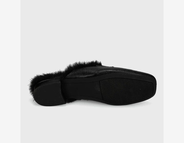 Vaneli Skyla black slip-on shoe with sleek design, showcasing smooth upper and comfortable sole for stylish everyday wear.