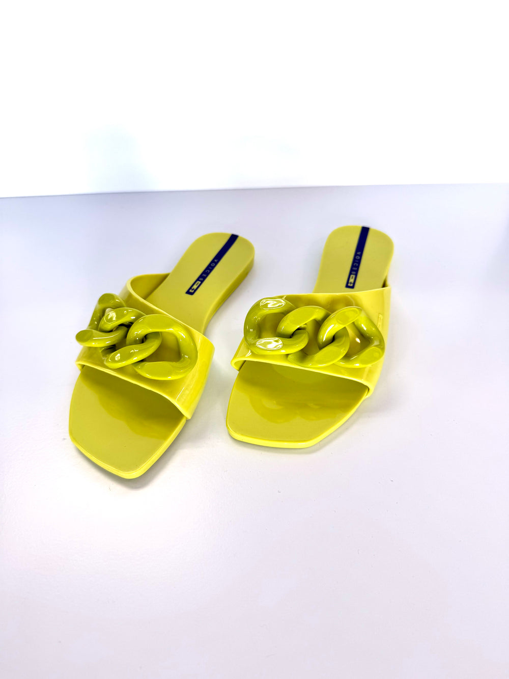 Voices Avolto Corrente Lime sandal accessory with adjustable straps and vibrant lime green color, designed for stylish footwear.