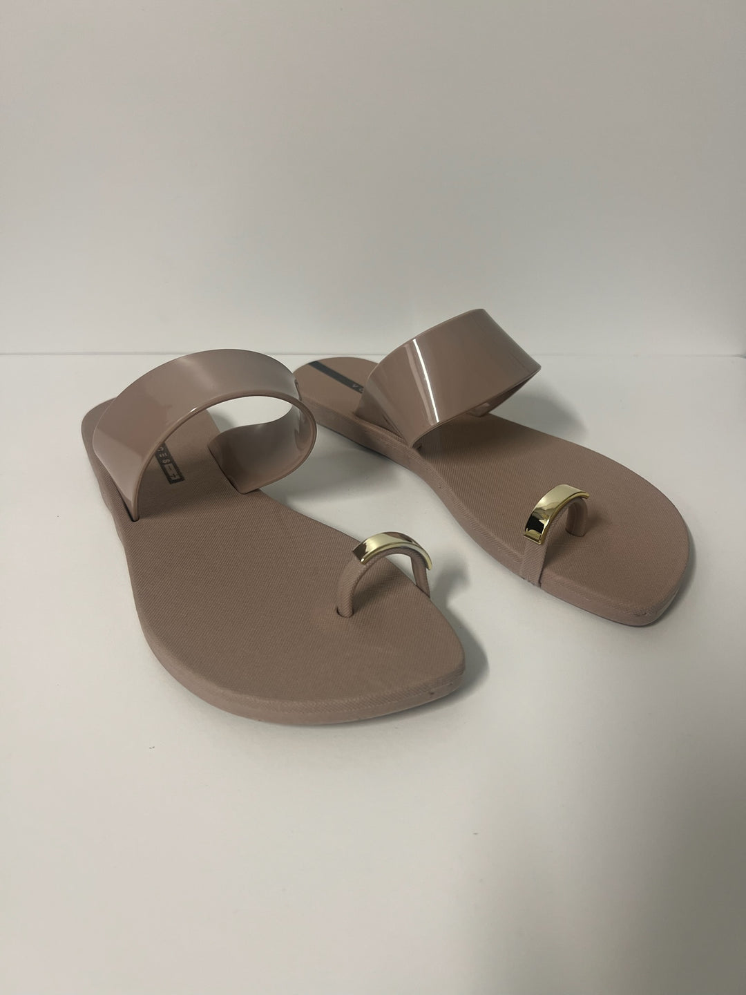 Voices Anello metal sandal accessory featuring sleek silver design, perfect for stylish footwear embellishments.